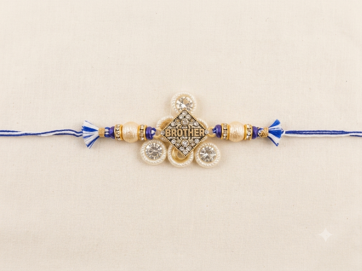 RichMade Premium BROTHER designer rakhi with crystal-studded centerpiece, pearl accents, decorative beads, and blue silk thread for Raksha Bandhan