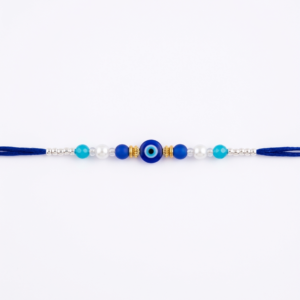 RichMade Evil Eye Rakhi for Brother with blue Nazar bead, pearl accents, and royal blue silk thread for Raksha Bandhan