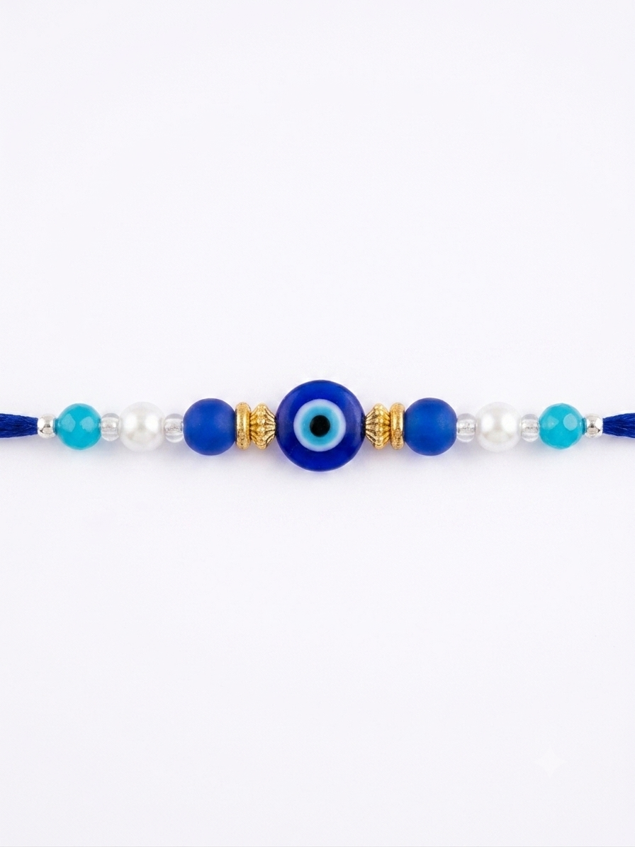RichMade Evil Eye Rakhi for Brother with blue Nazar bead, pearl accents, and royal blue silk thread for Raksha Bandhan