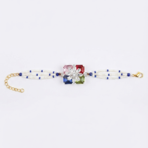 RichMade premium multicolor crystal bracelet rakhi with floral crystal centerpiece, pearl bead strands, and adjustable gold clasp for Raksha Bandhan