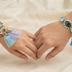 RichMade blue peacock Bhai Bhabhi Rakhi set with matching designer lumba for Raksha Bandhan.