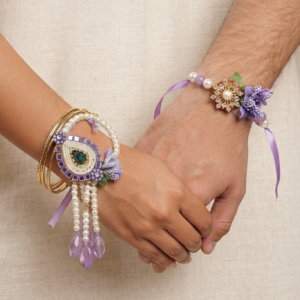 RichMade purple peacock Bhai Bhabhi Rakhi set with matching designer lumba for Raksha Bandhan.