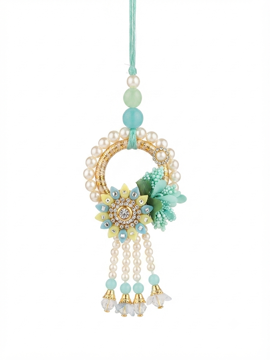 Elegant mint green floral lumba featuring pearl strings, crystal drops and handcrafted detailing.