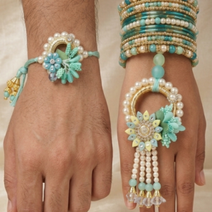RichMade mint green floral Bhai Bhabhi Rakhi set with matching designer pearl lumba for Raksha Bandhan.