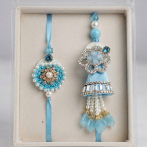 RichMade blue Bhai Bhabhi Rakhi Set featuring a handcrafted rakhi for brother and matching designer lumba for sister-in-law